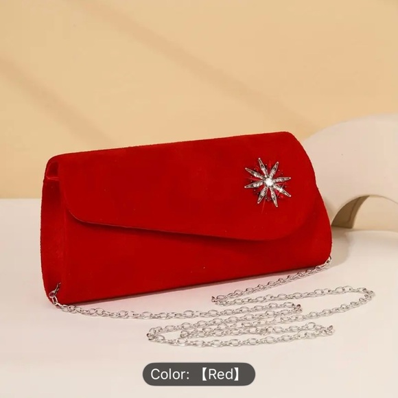 Elegant Red Clutch with Starburst Accent